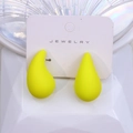 Neon yellow teardrop earrings with a matte finish displayed on a jewelry card - Yellow