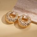 Detailed view of chunky 18K gold plated hoop earrings with textured hammered finish - Ear Clip - Gold (Hammered)