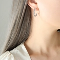 Silver-toned C-shaped shell textured hoop earrings in a minimalist vintage style - Steel