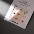Detail of luxury 3D turquoise nail charms with golden geometric frames in a gift box - MJ-004 Silver Stamping