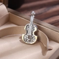 Elegant silver violin brooch with clear rhinestones on a beige silk jewelry box - Lz031-silver White