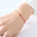 Elegant red string and gold-plated titanium steel bracelet with red round zircon - July Red