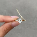 Elegant gold four-prong adjustable wedding ring featuring oval and pave set diamonds - US 6 / Gold
