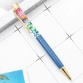 Blue ballpoint pen with colorful dried flowers in transparent oil barrel and gold accents - Deep Blue (Gold Trim)