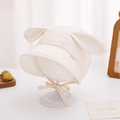 Detailed view of cream baby hat featuring plush rabbit ears and soft chin straps - 46-48cm (6-15 Months) / Off White
