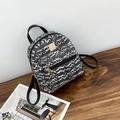 Modischer Mini-Rucksack mit schwarz-weißem Webmuster und goldenen Reißverschlüssen - Geflochtener Stil / Schwarz (Schwarz-Weiß-Tweed)
