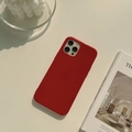 Detail of red matte silicone phone case featuring full camera lens protection and soft texture - Burgundy / 13pro