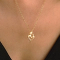 Golden heart necklace featuring a mother and child pendant with white zircon stones - Gold Mother Child Intertwined (K-619)