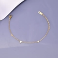 Minimalist 18K gold titanium steel bracelet featuring three delicate heart pendants - 18K Gold