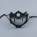 Detailed view of black tactical half-face beast mask with sharp fangs and bone texture - Tiger Black