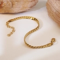 Elegant 18K gold-plated flat curb link bracelet with adjustable lobster clasp on stone - Bracelet / Gold