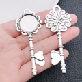 Detail view of antique silver alloy heart key pendants for DIY jewelry making projects - Key Base Pendant (6341)