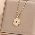Detailed close-up of golden evil eye pendant necklace with colorful cubic zirconia - Gold Colorful Zirconia Blue Enamel