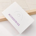 Close-up of a white accessories display card with elegant purple lettering for hair ties - 9x6cm White Card with Purple Text / 1 Sheet
