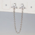 Detailed view of silver flower chain earrings with sparkling cubic zirconia on display card - Silver White Rhinestone