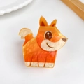 Cute orange and beige fox shaped acrylic hair clip with a glossy textured finish - Fox