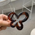 Elegant butterfly hair claw clip in dark amber tortoiseshell resin finish - Glossy Red Brown