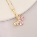 Detail of a gold butterfly necklace featuring pink pear-shaped and clear baguette stones - Butterfly Style Pink Clear Gem (17#)