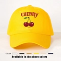 Detail of yellow cotton cherry print baseball cap showing color range options - One Size / Bright Yellow