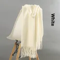 Thick off-white cashmere scarf for women and men with elegant tassel details on a chair - Tassel Style / 220g (200x70cm) / White