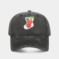 Close-up of a vintage black baseball cap featuring a detailed Christmas stocking embroidery - Adjustable / Christmas Sock Pattern Black
