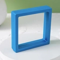 Square light blue floating jewelry display box with transparent PE film and push button - Suspension Box / Blue