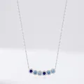 Elegant S925 sterling silver necklace featuring a gradient of six blue round gemstones - 925 Silver / Gradient Blue