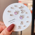 Detail of Korean-style mixed earrings set featuring bow, pearl, and zircon designs - Silver Pink Heart Butterfly (E0387-1)