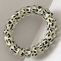 Spiral telephone cord hair tie with black and white cow print pattern for women - Cow