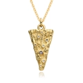 Macro shot of gold-plated planet pendant with irregular texture and cubic zirconia crystals - Irregular Triangle Style (B096)