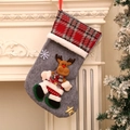 Detail of grey felt Christmas stocking with plush reindeer and red tartan cuff decor - Elk Style