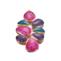 Detailed macro view of colorful enamel flower pendant with gold metal framing on white background - Rose Red