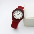 Detailed close-up of dark red silicone quartz watch with white dial on white gift box - Red