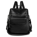 Trendy black leather travel backpack for women with tassels, fits 14-inch laptops - Black