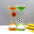 Heart-shaped double liquid timer with orange and green droplets and sports buoys - SY01 Heart Football Basketball