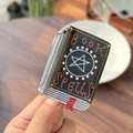 Halloween Book of Spells hair claw clip with black glitter finish and red star accent - Black
