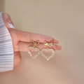 Elegant gold bow and heart drop earrings with shimmering white crystals for women - Gold Bow Hollow Heart Inlaid Diamond Drop Earrings(E2030-1)