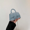 Light blue beaded chain handbag made of textured lychee leather with a mini handle - Blue