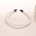 Detail van de witte pailletten hoofdband met glittertextuur en zwarte stoffen tips - Wit