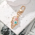 Ice cream shaped gold keychain with colorful real dried flowers on white stone - Ice Cream Pink Blue White Flower