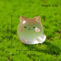Cute glowing miniature cat resin figurine with amber and teal gradient finish - Coffee (Long Tail Kitten)