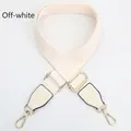 Detail of adjustable off-white canvas strap with gold metal hooks and reinforced stitching - Rice White Strap-Rice White Leather / Light Gold Buckle