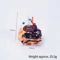 Portachiavi a forma di waffle natalizio con crema bianca e scritta Merry Christmas, 35,5g - Torta waffle arancione con cinturino rosa