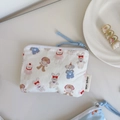Detail of cartoon animal print cotton coin purse with zip closure and fabric label - White Rabbit & Bear