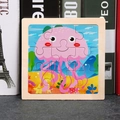 Square wooden puzzle featuring a pink jellyfish cartoon for early educational play - Jellyfish
