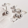 Elegant U-shaped silver-grey pearl drop earrings with quilted silver leverback clasp - Minimalist Single Pearl / Silver Gray