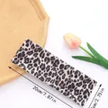 Flat leopard print headband dimensions shown as 20cm long and 7cm wide for yoga and sports - Style A