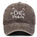 Close-up of Cat Mom embroidery and cat whiskers on vintage washed baseball cap fabric - Coffee