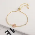 Adjustable gold sunflower bracelet with pink crystal daisy and sparkling zircon accents - Pink Flower