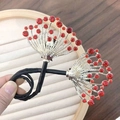 Bigoudi noir élégant avec accents en éventail doré et strass rouges brillants - Gypsophile Rouge